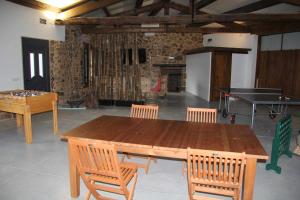 A kitchen or kitchenette at O Fogón Casa Ferrador Ribeira Sacra
