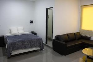 Postel nebo postele na pokoji v ubytování Hotel HSR