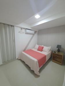 Postel nebo postele na pokoji v ubytování Malecon Premium Rooms & Hotel