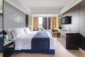 Katil atau katil-katil dalam bilik di Harbour Plaza 8 Degrees