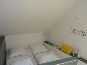 Кровать или кровати в номере La Maison de Madame Baudy