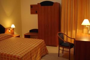 Posteľ alebo postele v izbe v ubytovaní Sait Hotel & BB
