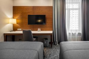 TV a/nebo společenská místnost v ubytování CITYHOTEL