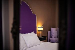 Posteľ alebo postele v izbe v ubytovaní JB Relais- Campo de' Fiori