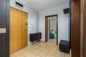 Televízia a/alebo spoločenská miestnosť v ubytovaní Sleepway Apartments - Garbary 95-112a