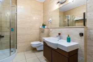 Kúpeľňa v ubytovaní Sleepway Apartments - Garbary 95-112a