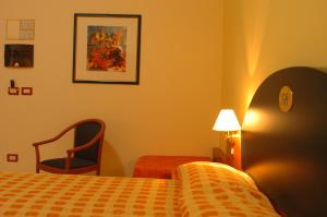 Posteľ alebo postele v izbe v ubytovaní Sait Hotel & BB