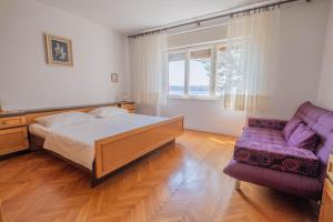 Postel nebo postele na pokoji v ubytování Apartman Sonja