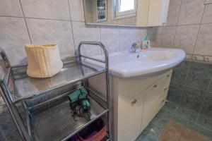 Kúpeľňa v ubytovaní Apartman Ahel Jadranovo