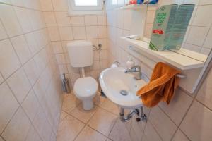 Kúpeľňa v ubytovaní Apartman Ahel Jadranovo