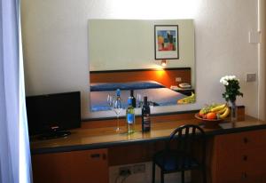 Una cocina o zona de cocina en Hotel Nuova Grosseto