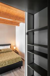 Postel nebo postele na pokoji v ubytování Casa Langhe