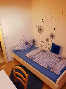 Кровать или кровати в номере Ferienhof Kink