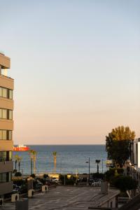 a view of the ocean from a building at Old Port Hotel in Limassol