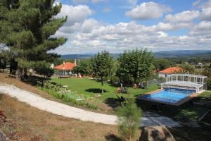 The swimming pool at or close to O Forno Casa Ferrador Ribeira Sacra