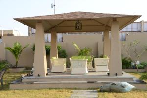 Zahrada ubytování Lords Inn Jamnagar -Motikhavdi