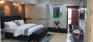 Voodi või voodid majutusasutuse Lantana Hotel toas