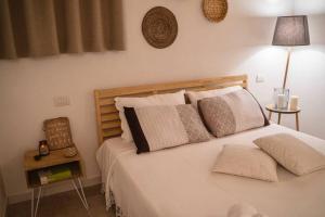 Postel nebo postele na pokoji v ubytování DIMORI Guest House