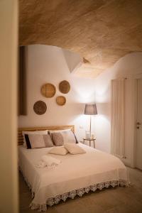 Postel nebo postele na pokoji v ubytování DIMORI Guest House