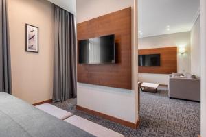 TV a/nebo společenská místnost v ubytování CITYHOTEL