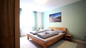 a bedroom with a bed in a room at central & lovely - for up to 6 persons in Würzburg