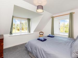 Ένα ή περισσότερα κρεβάτια σε δωμάτιο στο Rowan House