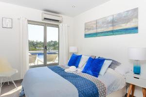 Posteľ alebo postele v izbe v ubytovaní Graham Holiday Rentals - Baladrar + 23 fotografií