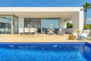 Bazén v ubytovaní Graham Holiday Rentals - Baladrar alebo v jeho blízkosti