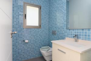 Kúpeľňa v ubytovaní Graham Holiday Rentals - Baladrar