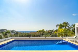 Bazén v ubytovaní Graham Holiday Rentals - Baladrar alebo v jeho blízkosti