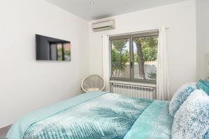 Posteľ alebo postele v izbe v ubytovaní Graham Holiday Rentals - Baladrar