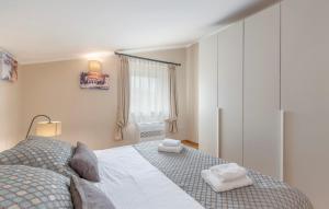 Postel nebo postele na pokoji v ubytování Villa Andrea