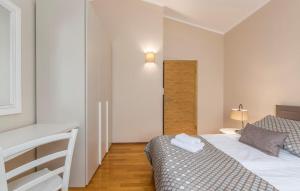 Postel nebo postele na pokoji v ubytování Villa Andrea