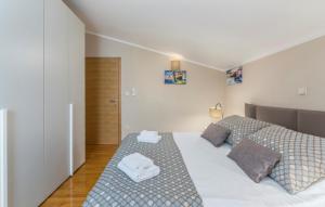 Postel nebo postele na pokoji v ubytování Villa Andrea