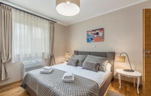Postel nebo postele na pokoji v ubytování Villa Andrea