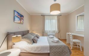 Postel nebo postele na pokoji v ubytování Villa Andrea + 37 fotografií