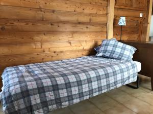 Krevet ili kreveti u jedinici u okviru objekta Chalet Beauroc