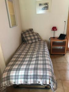 Krevet ili kreveti u jedinici u okviru objekta Chalet Beauroc