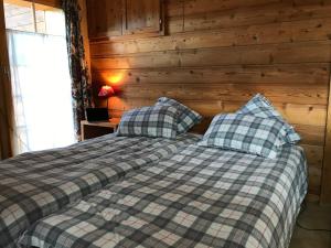 Krevet ili kreveti u jedinici u okviru objekta Chalet Beauroc