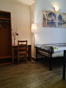 Posteľ alebo postele v izbe v ubytovaní Amber Hostel