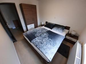 Кровать или кровати в номере Apartmani New York