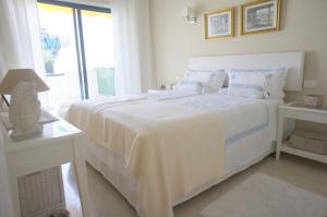 Posteľ alebo postele v izbe v ubytovaní Apartamento Vista Violetas