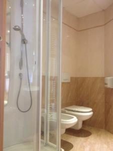 Koupelna v ubytování SIRIOHotel
