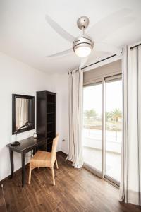 Телевизор и/или развлекательный центр в Ammouda Villas