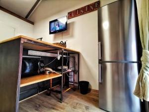 TV a/nebo společenská místnost v ubytování Regis B&B Appartamenti centro storico