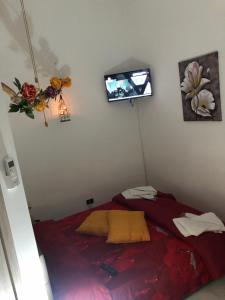 A bed or beds in a room at Planet casa vacanze