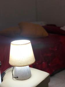 A bed or beds in a room at Planet casa vacanze