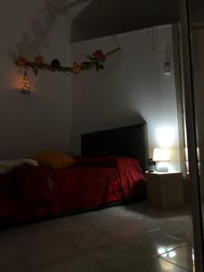 A bed or beds in a room at Planet casa vacanze