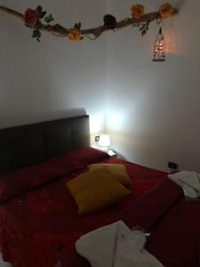 A bed or beds in a room at Planet casa vacanze