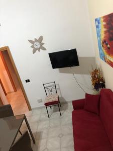 A television and/or entertainment centre at Planet casa vacanze